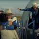 Wally Funk spreads her arms as she exits the New Shepard capsule